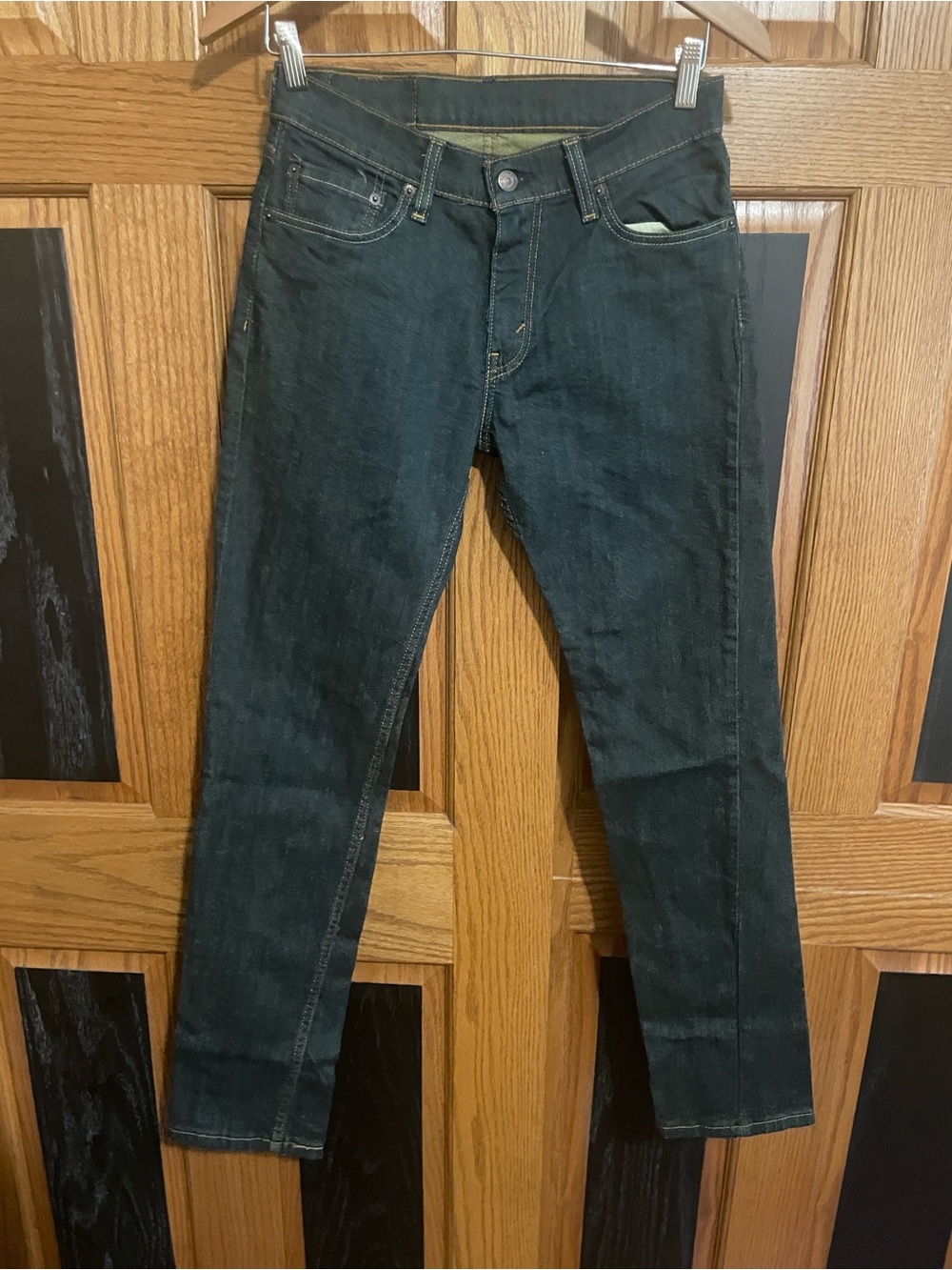 Men's Levi 511 Slim Straight Jeans. Dark blue. New and unwashed.